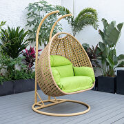 Light green cushion and light brown wicker hanging 2 person egg swing chair