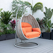 Orange cushion and light gray wicker hanging 2 person egg swing chair main photo