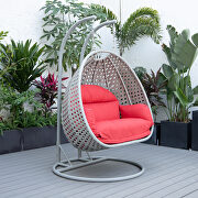 Red cushion and light gray wicker hanging 2 person egg swing chair main photo