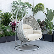 Taupe cushion and light gray wicker hanging 2 person egg swing chair main photo