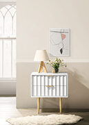 White stylish nightstand w/ golden handles and legs main photo