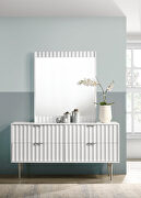 White stylish dresser w/ silver handles and legs