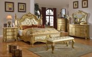 Rich gold royal style traditional bedroom main photo