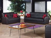 Black leatherette convertible sofa w/ storage