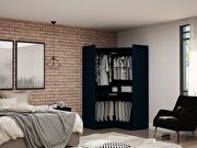 Modern open corner closet with 2 hanging rods in tatiana midnight blue