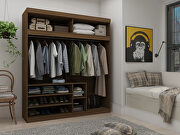 Open long hanging wardrobe closet with shoe storage in brown