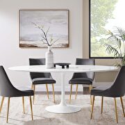 Oval wood top dining table in white main photo