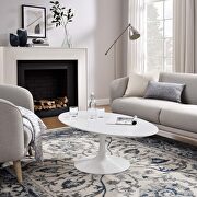 Oval-shaped wood top coffee table in white main photo
