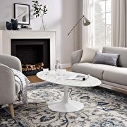 Oval-shaped artificial marble coffee table in white main photo