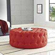 Upholstered fabric ottoman in atomic red