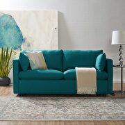 Upholstered fabric sofa in teal