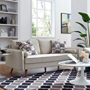 Beige upholstered couch main photo