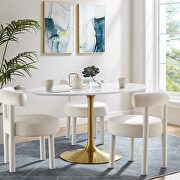 Oval wood dining table in gold white