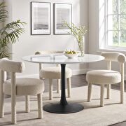 Round wood dining table in black white main photo