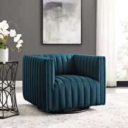 Tufted swivel upholstered armchair in azure