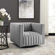 Tufted swivel upholstered armchair in light gray