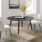 Round dining table in black main photo