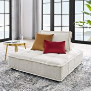 Tufted fabric armless chair in beige