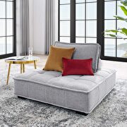 Tufted fabric armless chair in light gray
