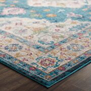 Distressed floral persian medallion area rug in blue, ivory, yellow and orange main photo