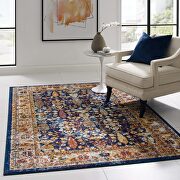 Distressed vintage floral lattice area rug in blue, orange, yellow and red main photo