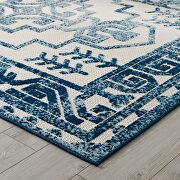 Ivory and blue distressed geometric southwestern aztec indoor/outdoor area rug main photo