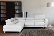 Sparta Italian leather sectional in white w/ adjustable headrests