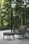 Indoor/outdoor dark gray wicker chair and ottoman main photo